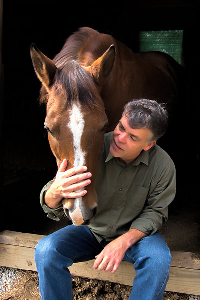 Daniel with rescued horse Picture
